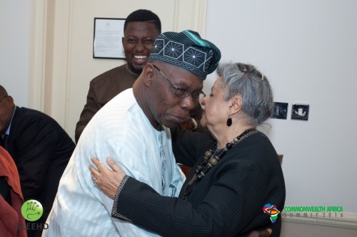 Co Chairs of the Commonwealth Africa Initiative Chief Obasanjo and Baroness Flather embraces as CAFI Africa Director Dayo Israel watches