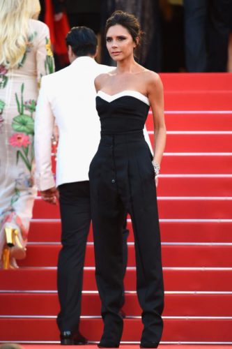 Victoria Beckham wearing her own designs