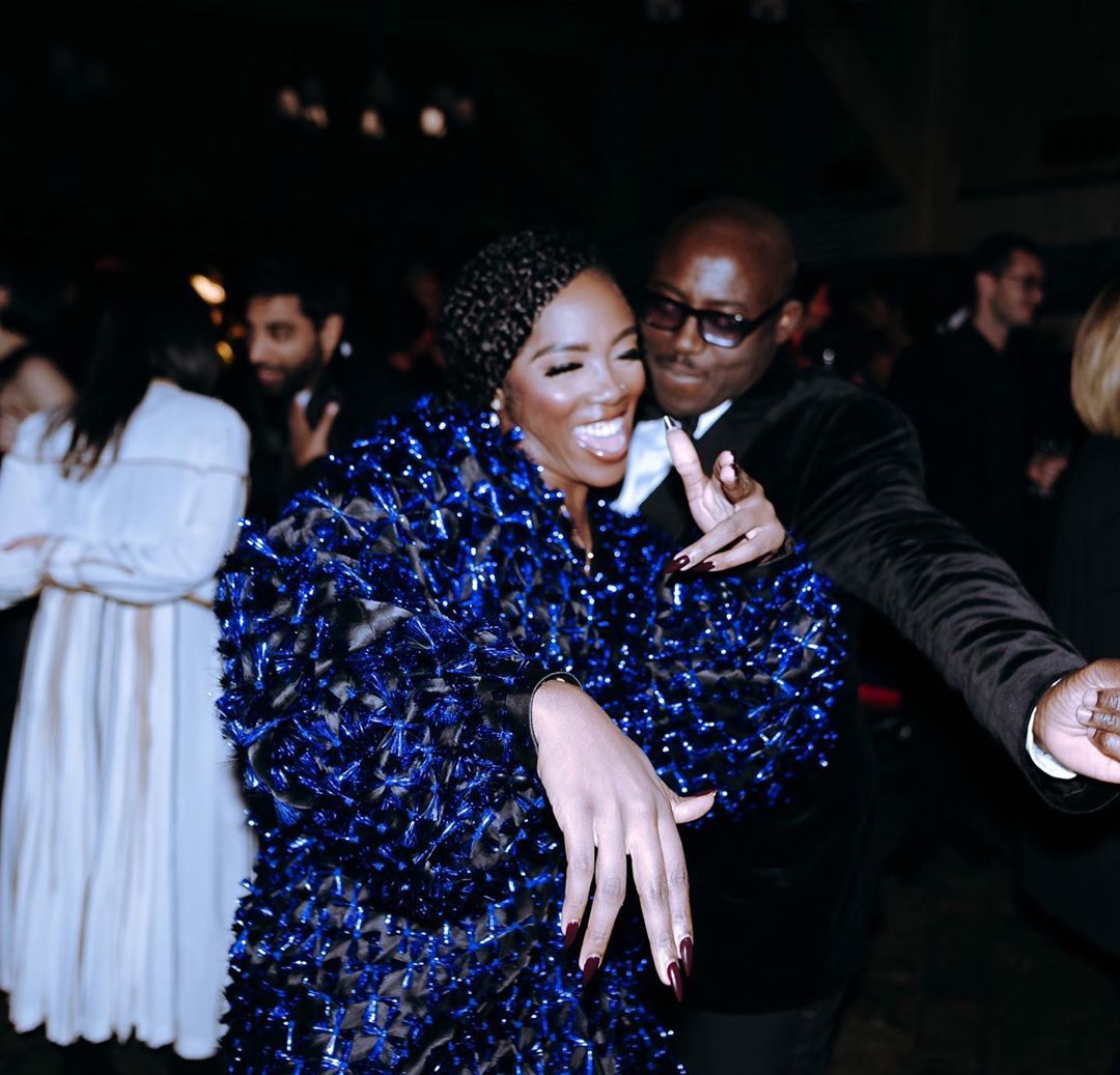 Tiwa Savage on the dancefloor with Edward Enninful at Business Of Fashion's Global VOICES Award 