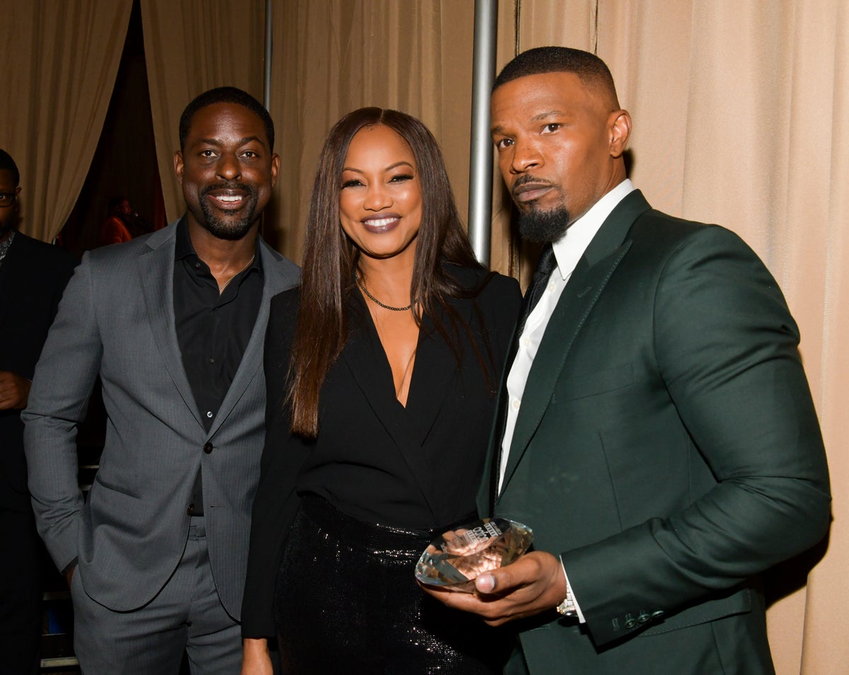 Sterling K. Brown, Garcelle Beauvais, and Jamie Foxx at African American Film Critics Association Awards